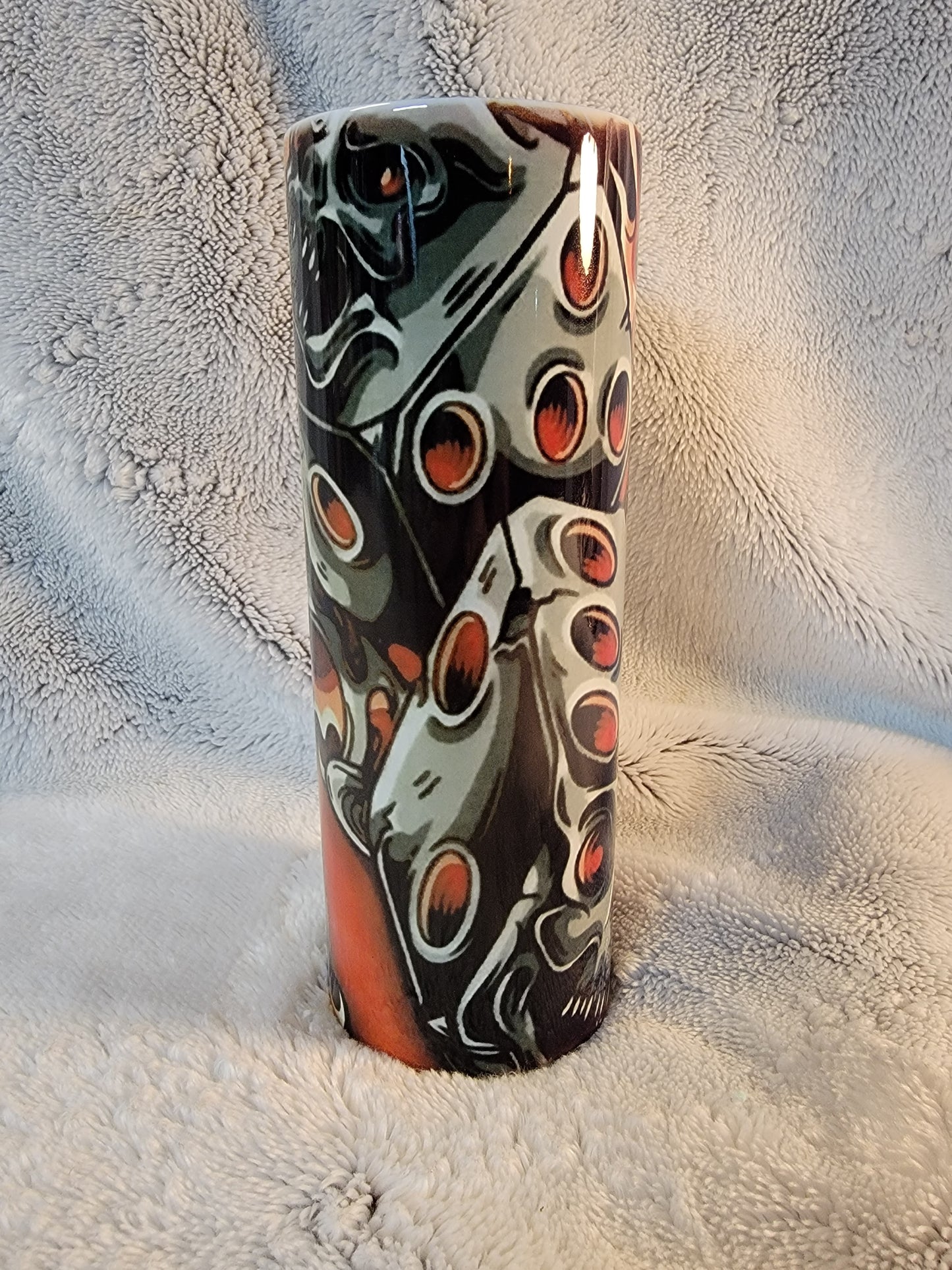 Orange and Black skull dice 20oz sublimination skinny tumbler.