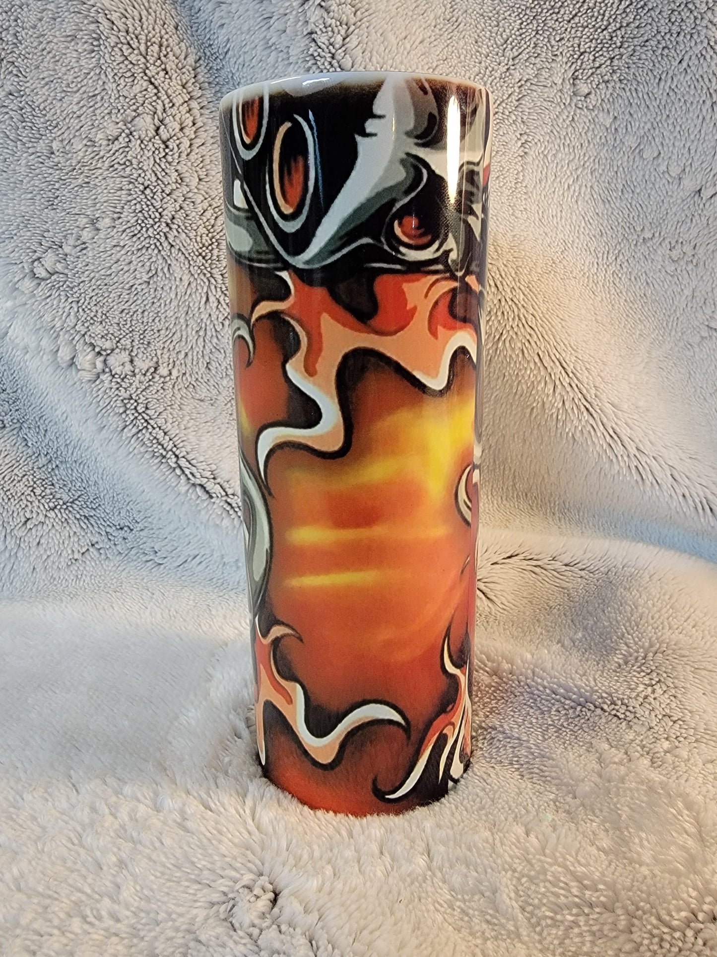 Orange and Black skull dice 20oz sublimination skinny tumbler.