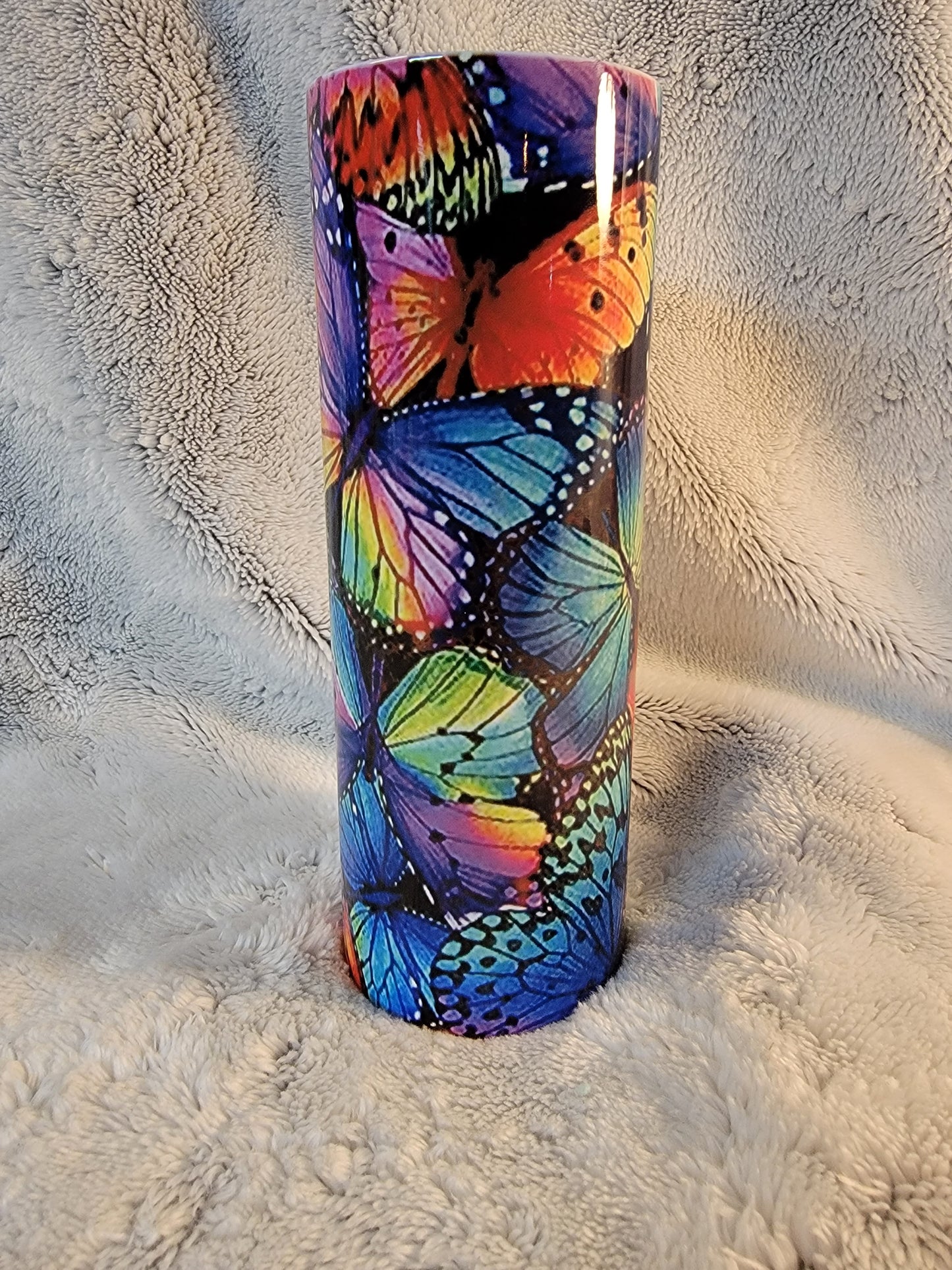 Multicolor butterfly 20oz sublimination skinny tumbler.