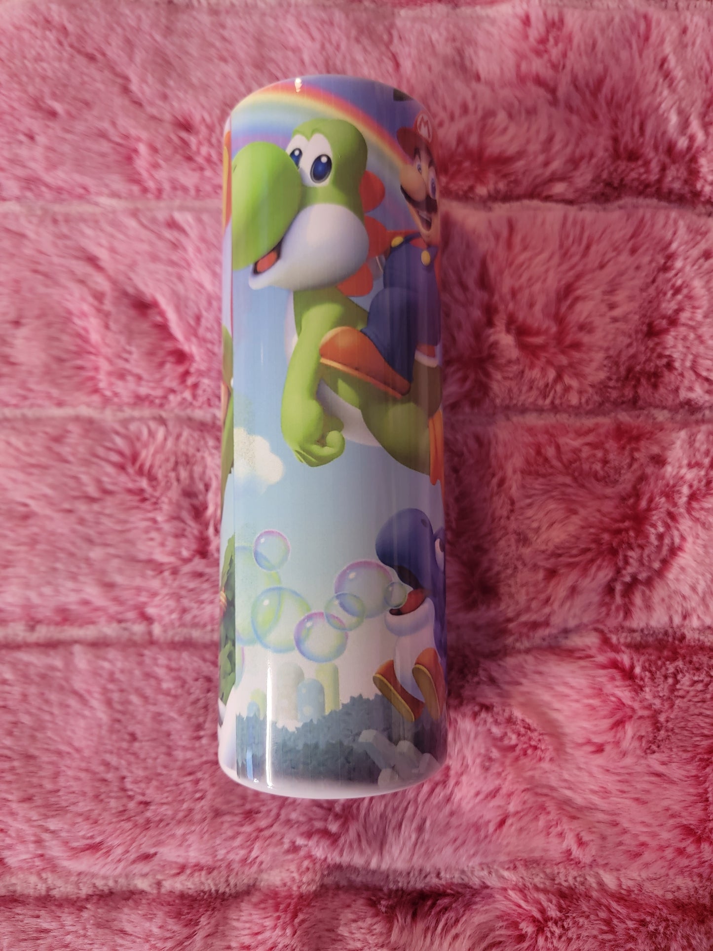 Super Mario Bros 20oz skinny tumbler.